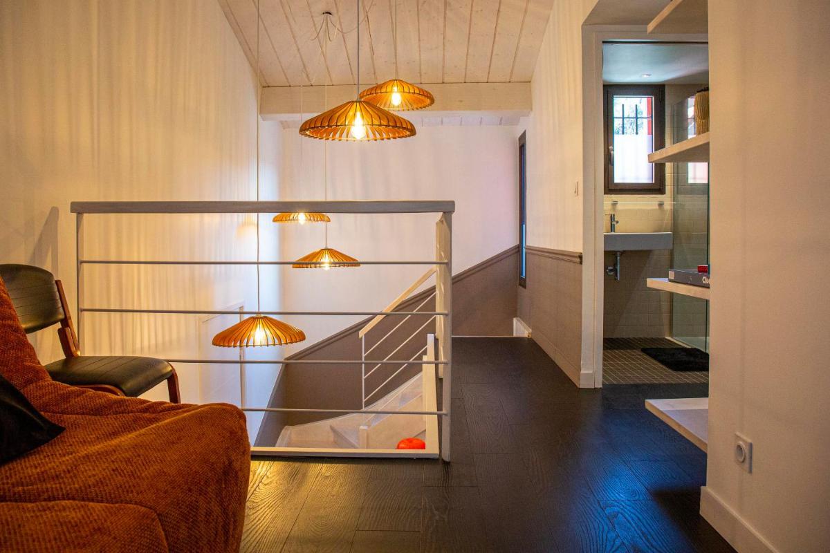 Un ou plusieurs lits dans un hébergement de l'établissement Hôtel & Spa Le Madeloc - Collioure Centre
