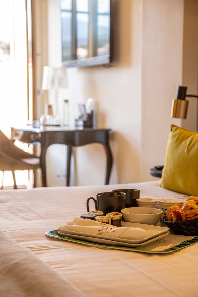 Un ou plusieurs lits dans un hébergement de l'établissement Hôtel & Spa Le Madeloc - Collioure Centre
