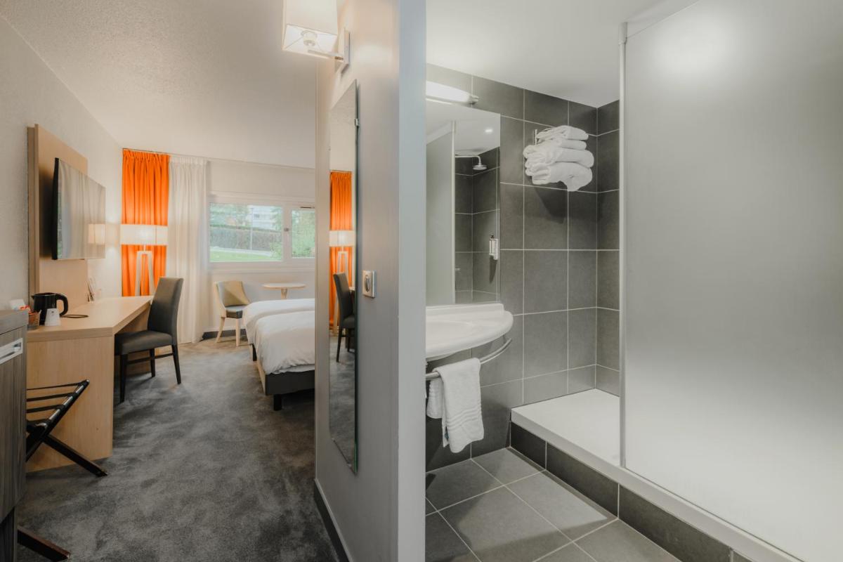 Salle de bains dans l'établissement Mercure Annecy Sud