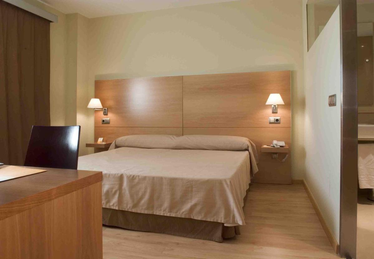 Cama o camas de una habitación en Executive Sport