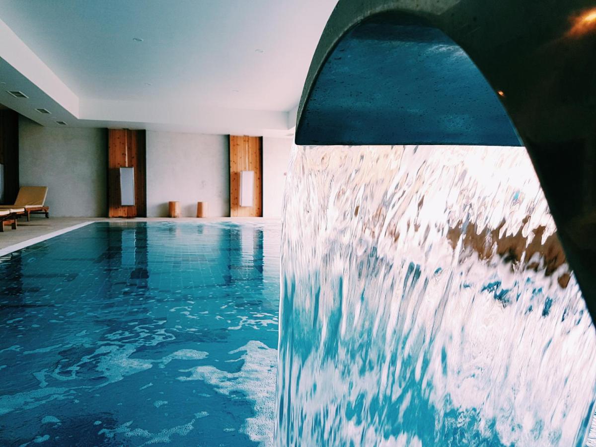 A piscina em ou perto de Pedras do Mar Resort & Spa