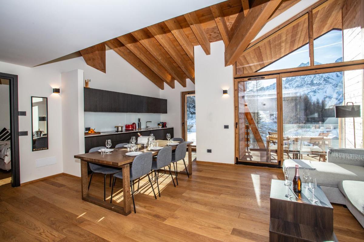FLORA ALPINA EXPERIENCE - "Ski-to-Door" Brand New Chalet Apartments with Indoor Garage and Mountain View - Housity