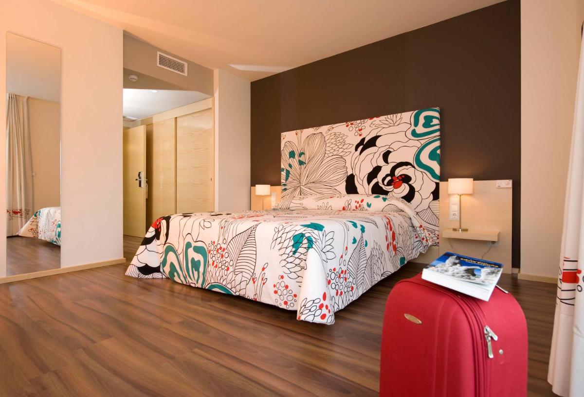 Cama o camas de una habitación en Executive Sport