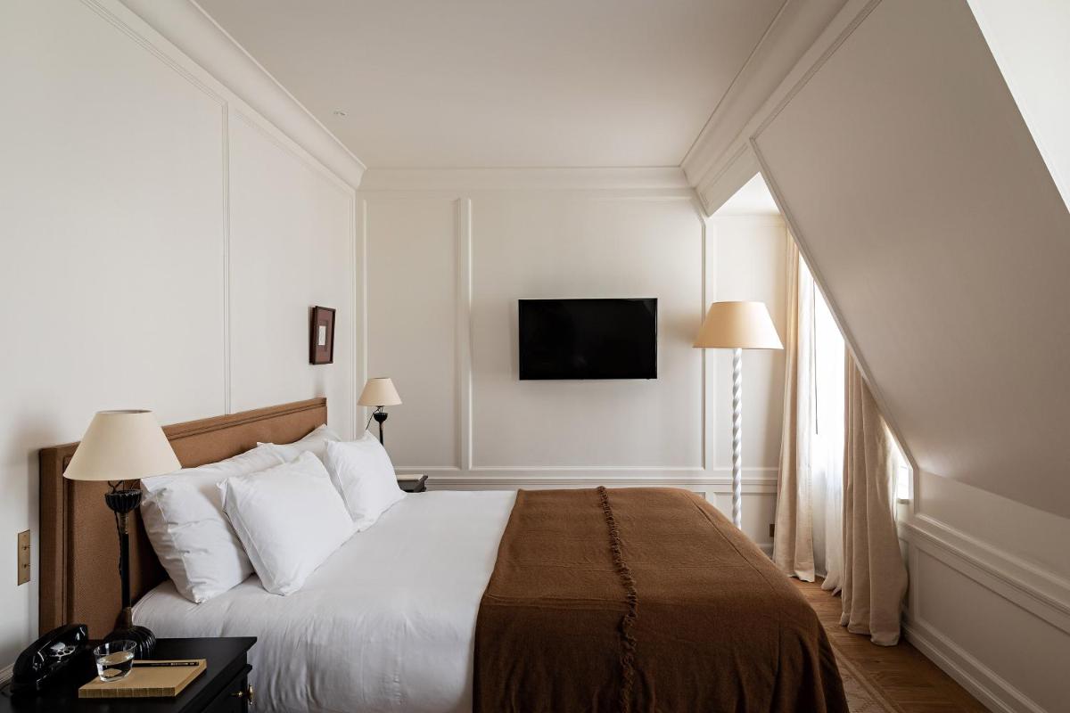 Un ou plusieurs lits dans un hébergement de l'établissement Hôtel Balzac Paris & Spa Ikoï