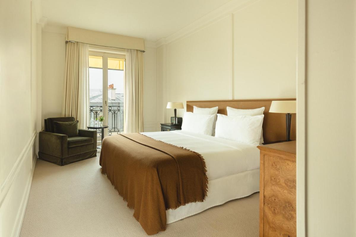 Un ou plusieurs lits dans un hébergement de l'établissement Hôtel Balzac Paris & Spa Ikoï