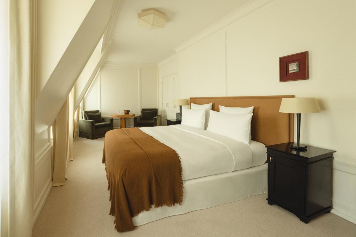 Un ou plusieurs lits dans un hébergement de l'établissement Hôtel Balzac Paris & Spa Ikoï