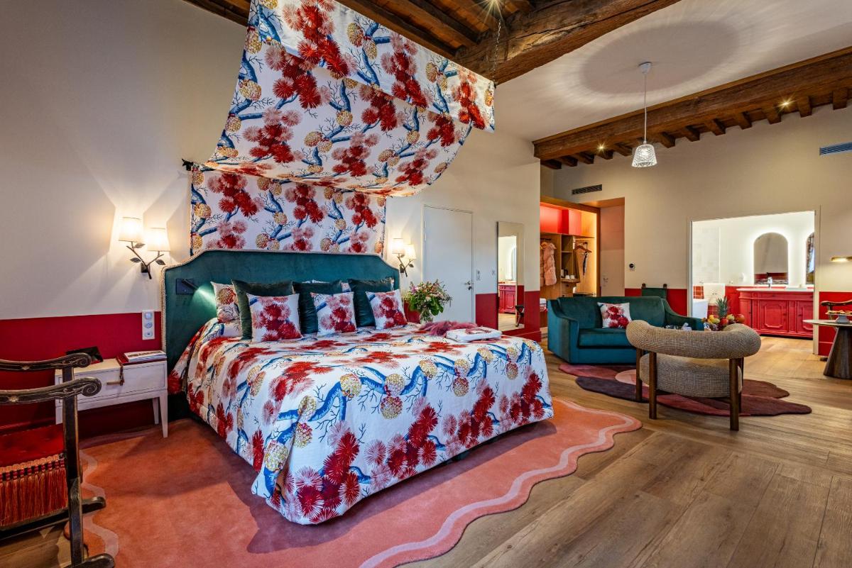 Coin salon dans l'établissement Hôtel Le Cep & Spa
