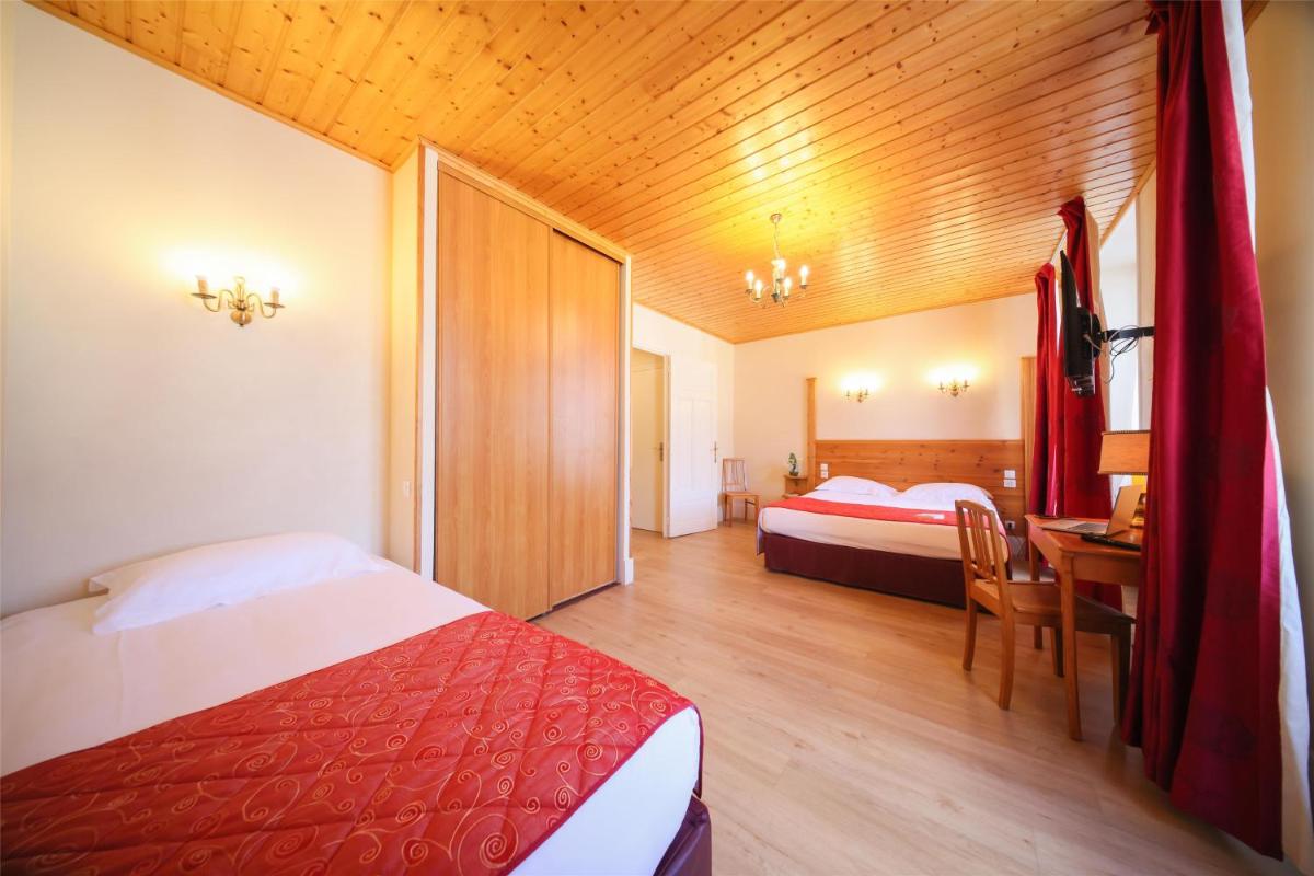 Un ou plusieurs lits dans un hébergement de l'établissement Best Western Grand Hotel de Paris & Spa