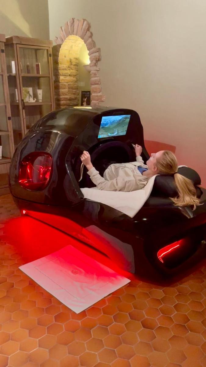 Télévision ou salle de divertissement dans l'établissement Hôtel Le Cep & Spa
