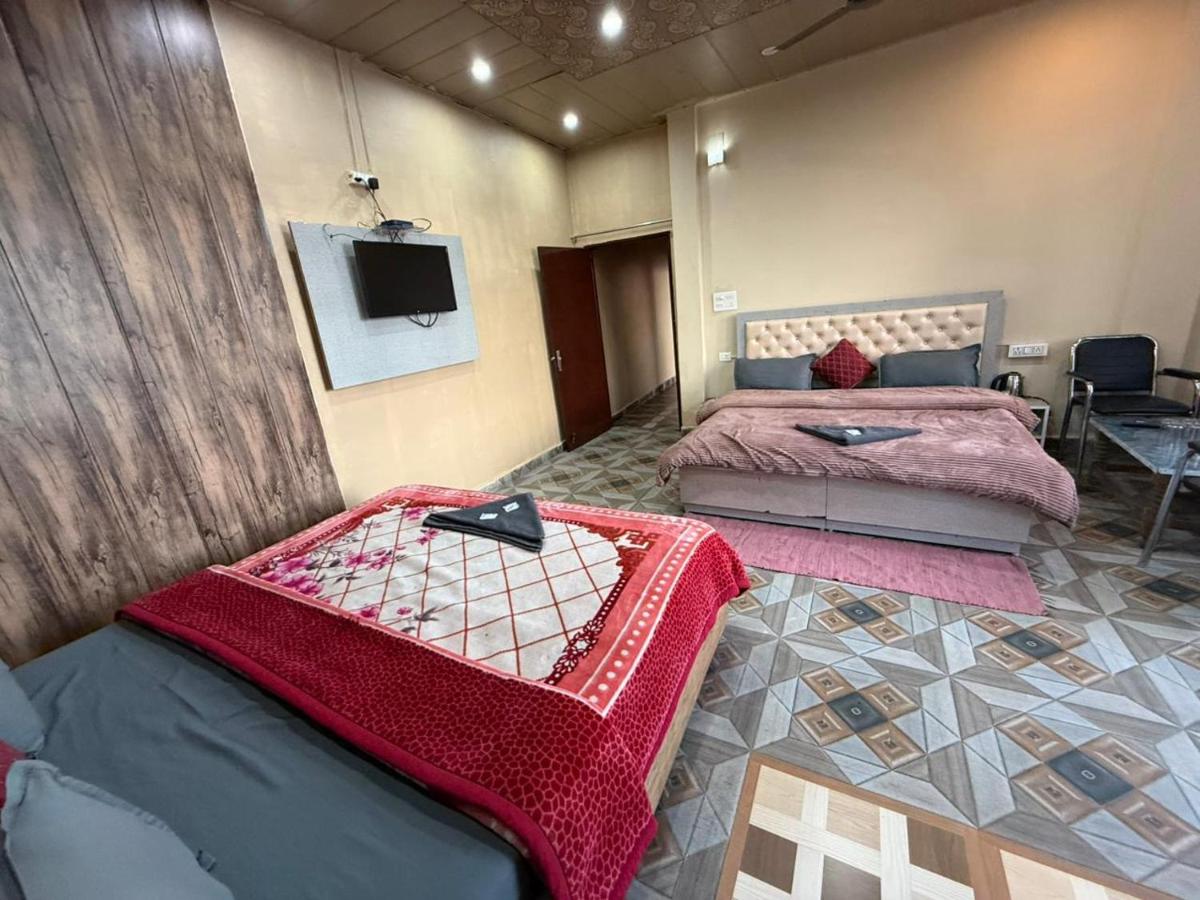 Hotel Sunrise Inn & Restaurant, Kanatal - Housity