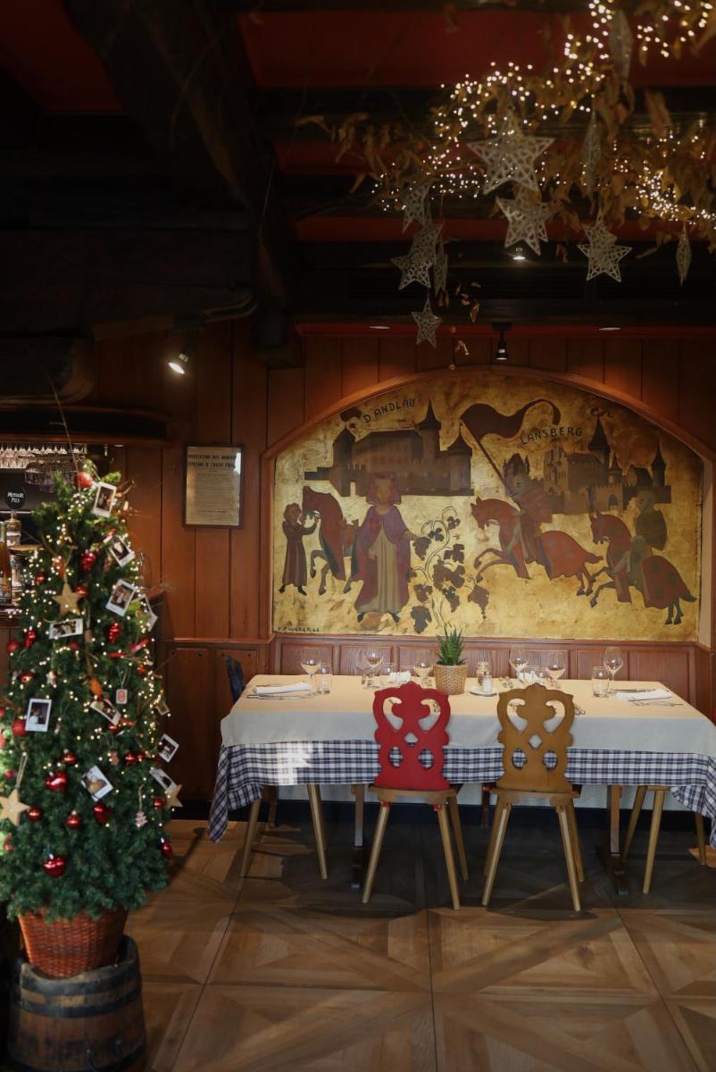 Restaurant ou autre lieu de restauration dans l'établissement Hôtel Arnold