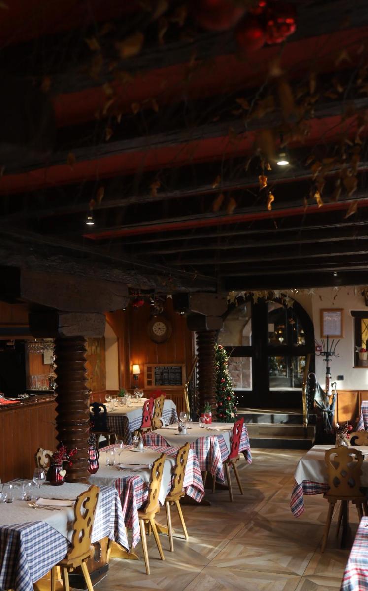 Restaurant ou autre lieu de restauration dans l'établissement Hôtel Arnold