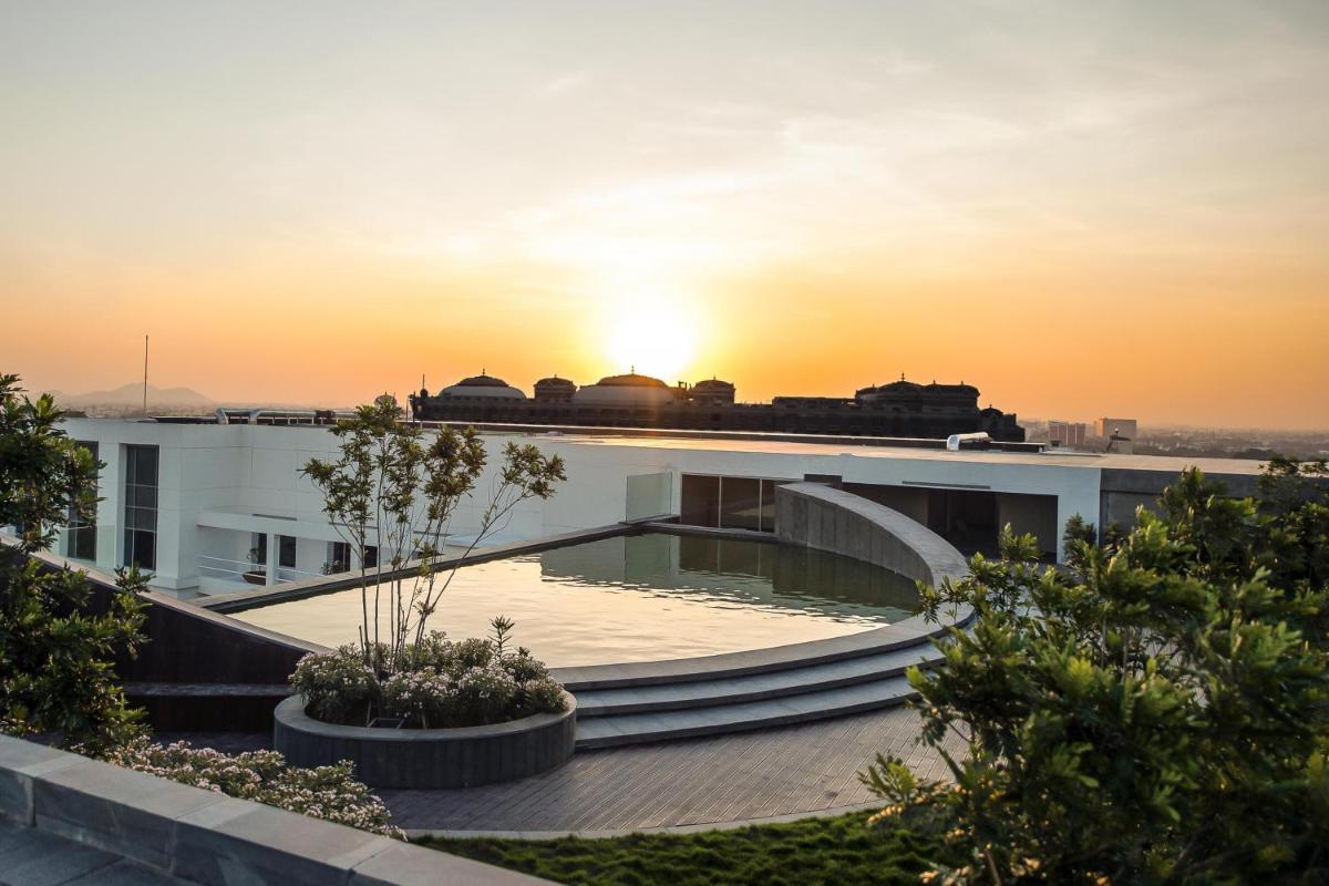 a view of the sunset from the roof of a building at Park Hyatt Chennai in Chennai