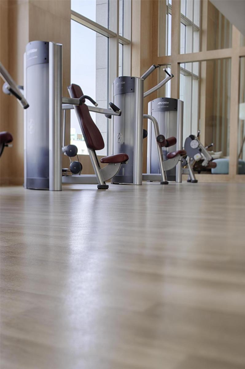 a room with a row of chairs in a gym at Park Hyatt Chennai in Chennai