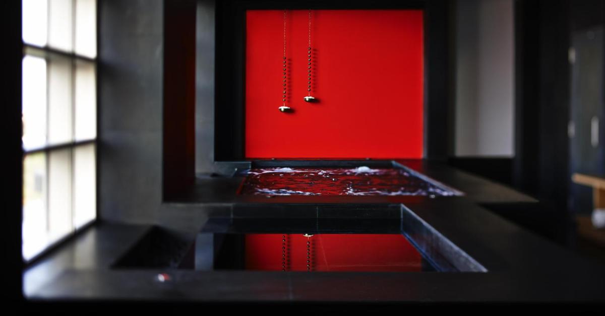 a red door with a chain in front of it at Park Hyatt Chennai in Chennai