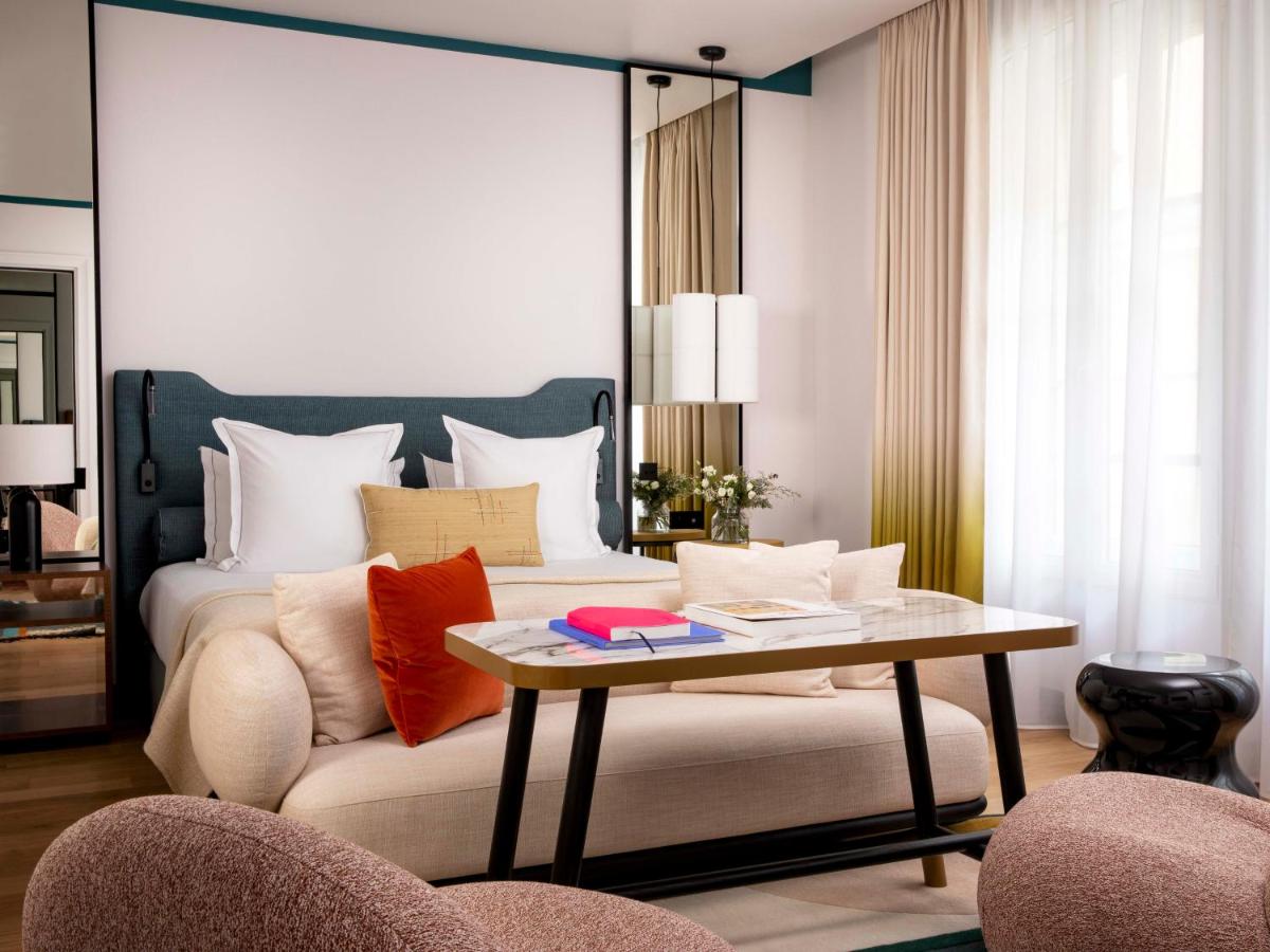 Coin salon dans l'établissement Hôtel Bel Ami
