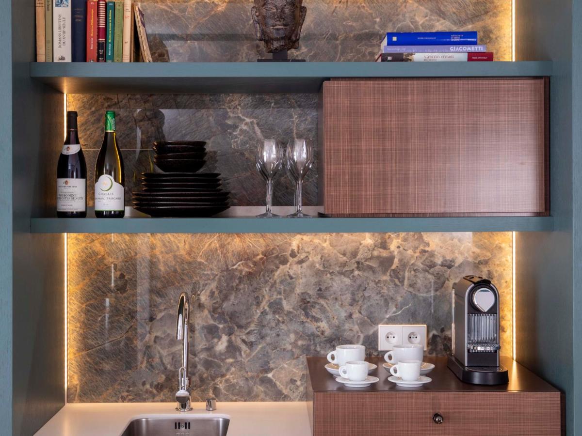 Cuisine ou kitchenette dans l'établissement Hôtel Bel Ami