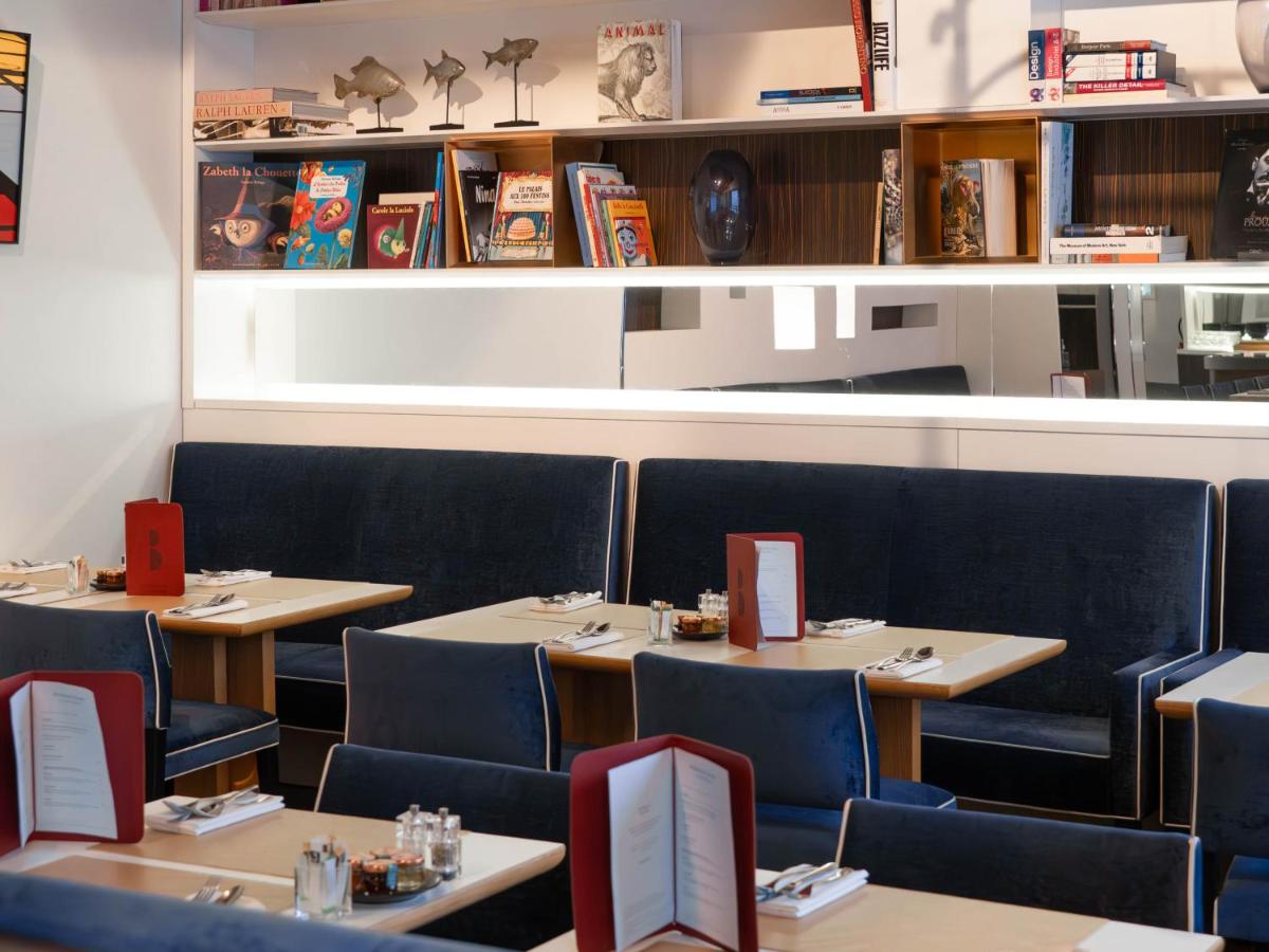 Coin salon dans l'établissement Hôtel Bel Ami