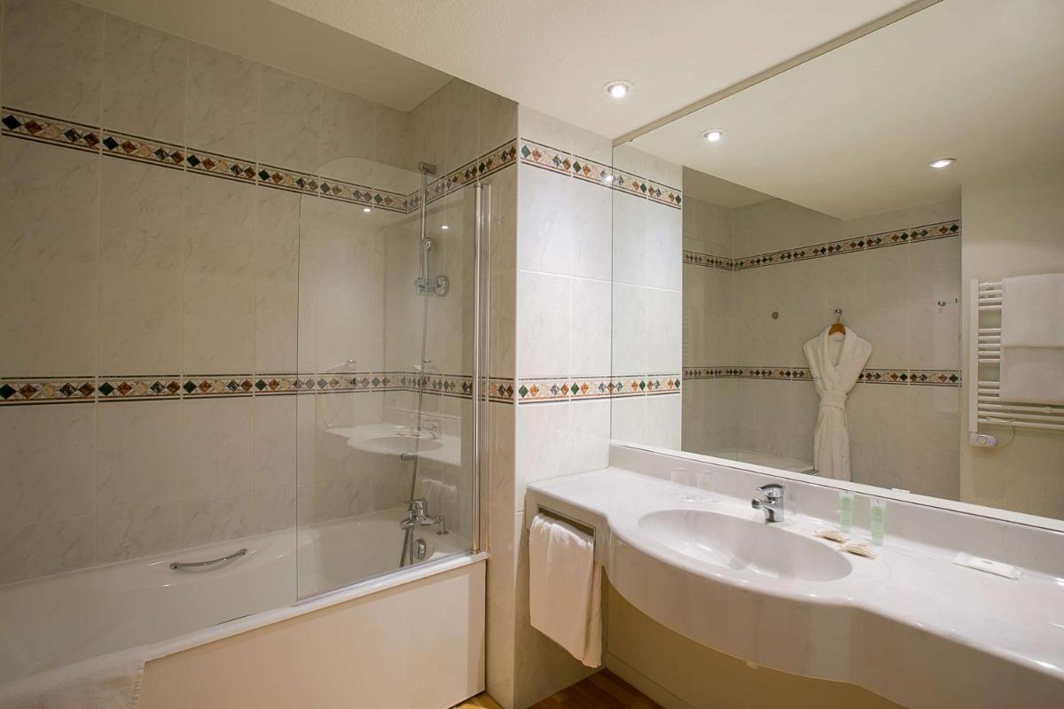 Salle de bains dans l'établissement Best Western Hotel Sourcéo