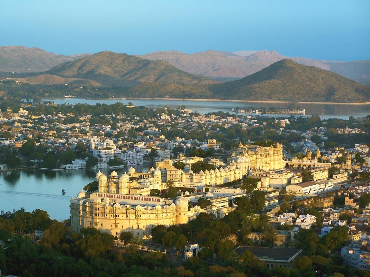 an aerial view of a city with a large building at Shiv Niwas Palace by HRH Group of Hotels in Udaipur