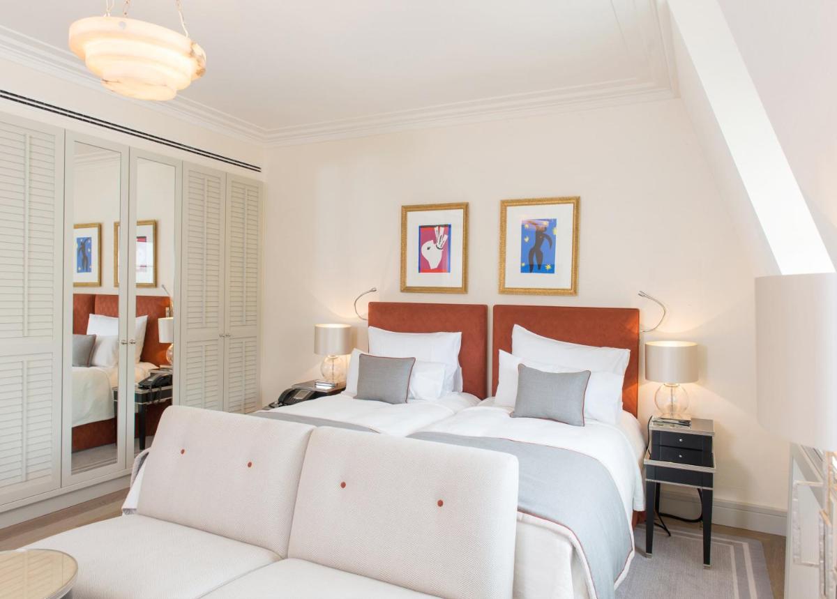 Ein Bett oder Betten in einem Zimmer der Unterkunft Brenners Park Hotel & Spa, Oetker Hotels