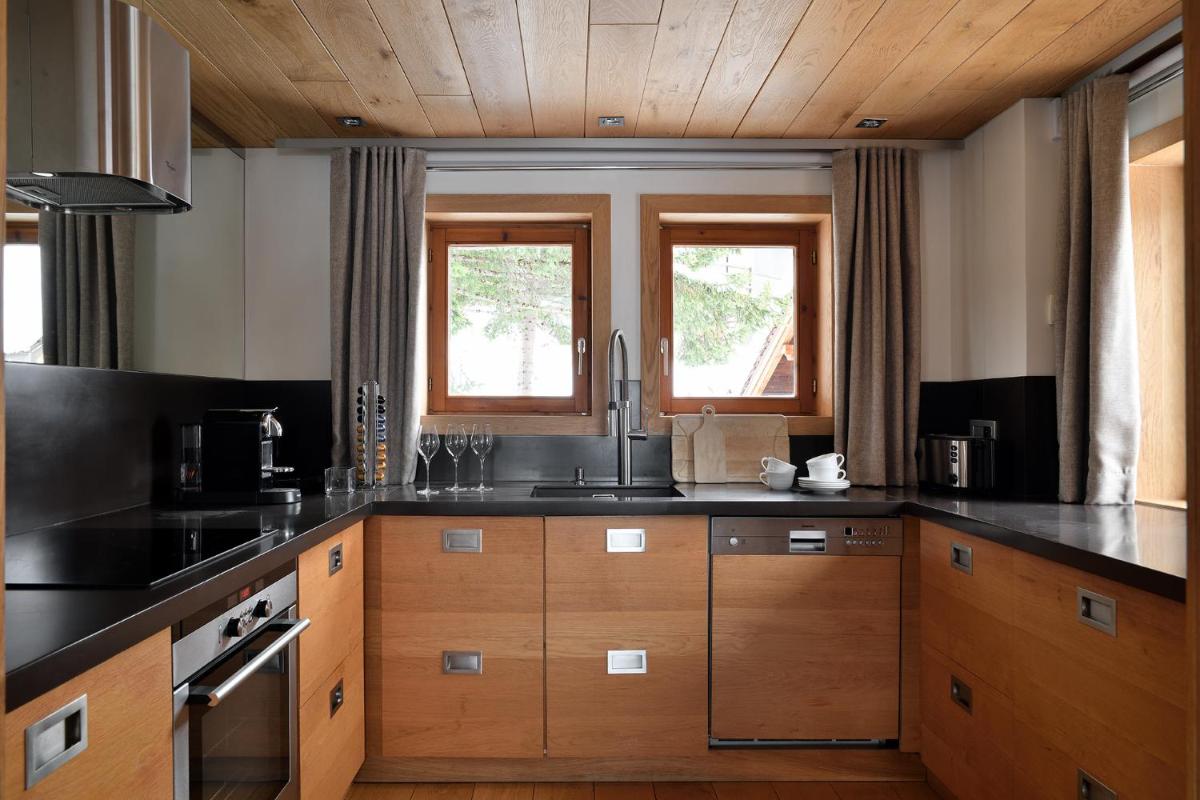 Cuisine ou kitchenette dans l'établissement Le Strato