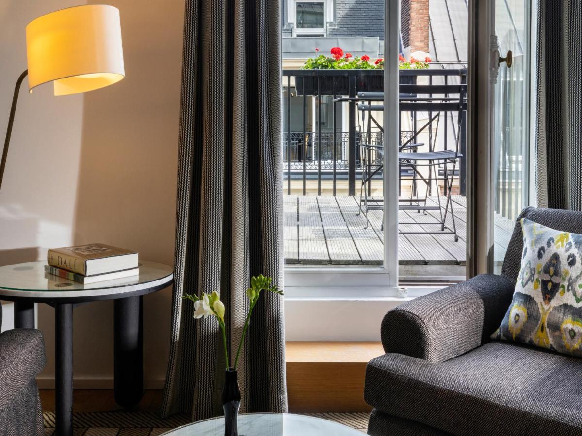 Coin salon dans l'établissement Hôtel Vernet Champs Elysées Paris