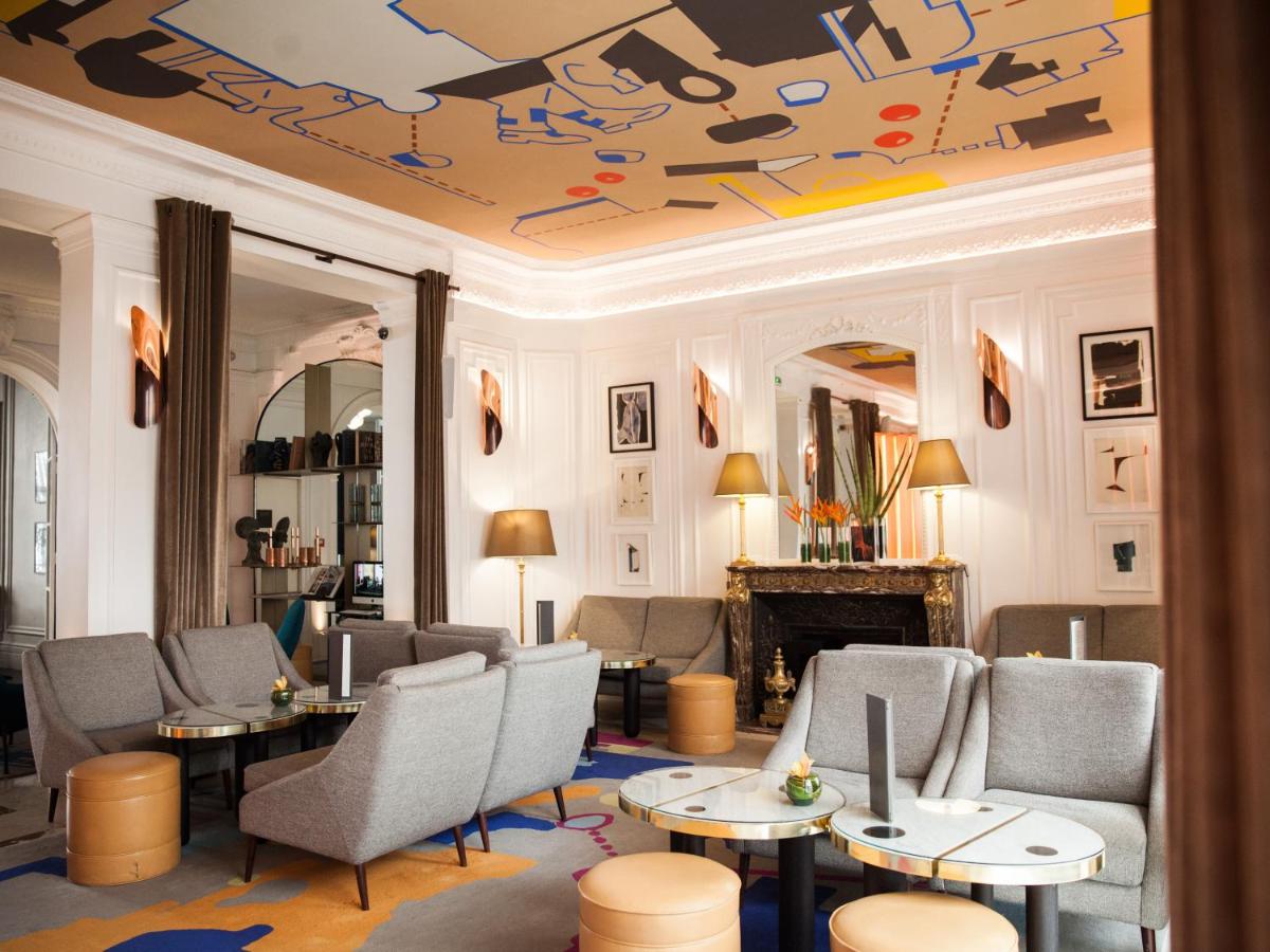 Coin salon dans l'établissement Hôtel Vernet Champs Elysées Paris