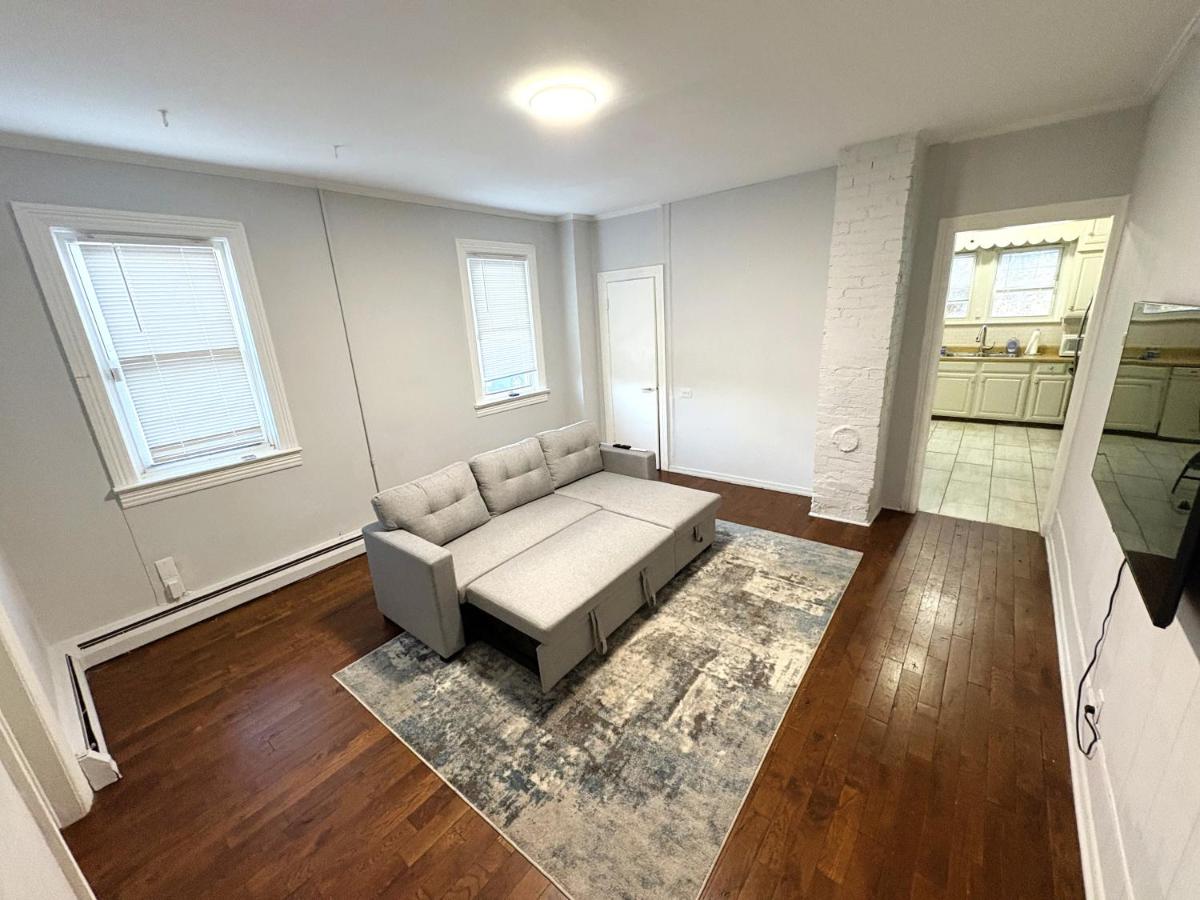 Cozy 1BR Apt with Workspace Near Train Station & Downtown - Housity