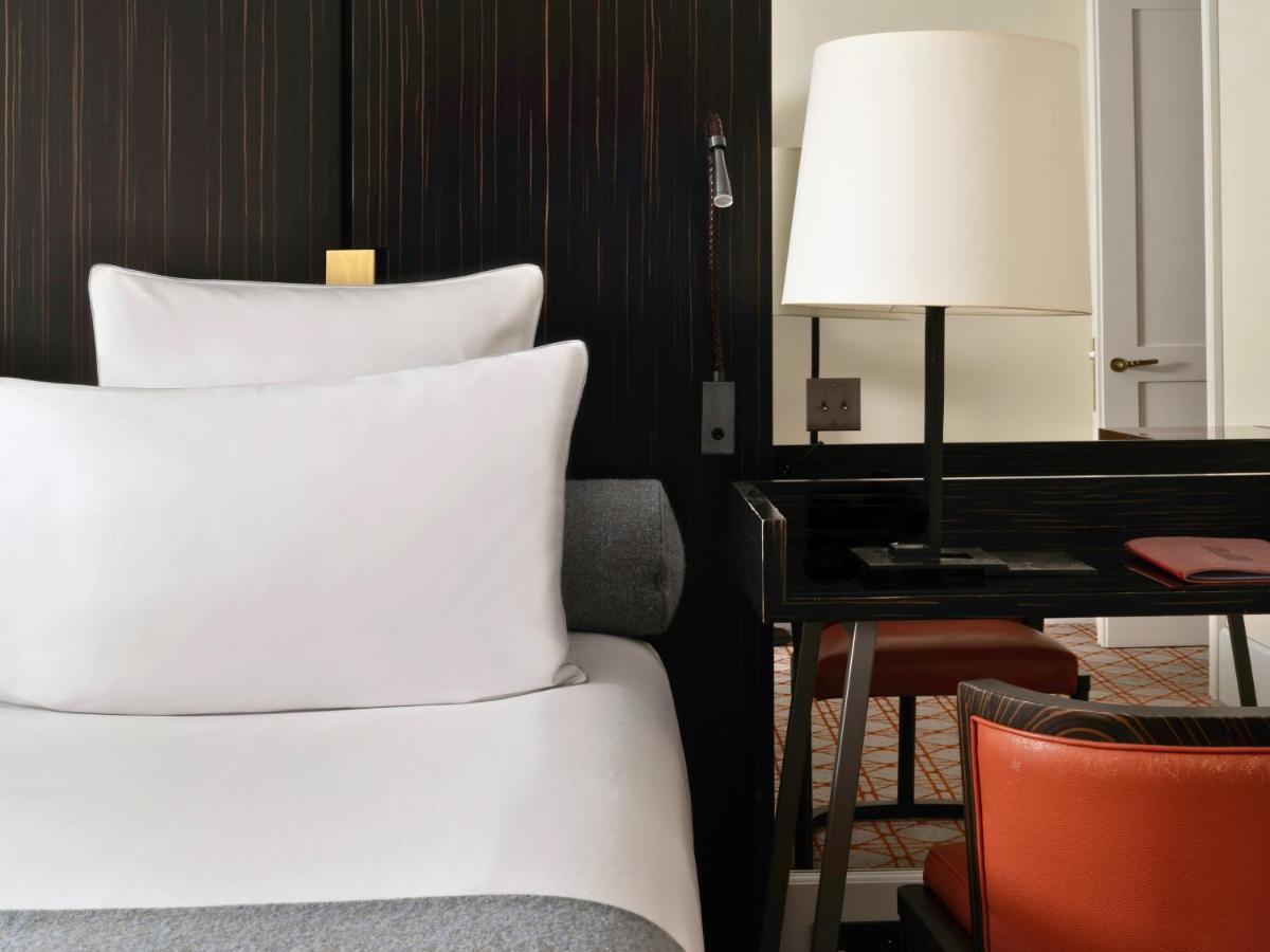 Un ou plusieurs lits dans un hébergement de l'établissement Hotel Montalembert