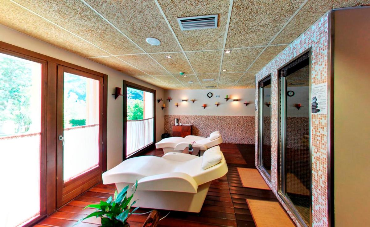 Cama o camas de una habitación en Silken Ordesa