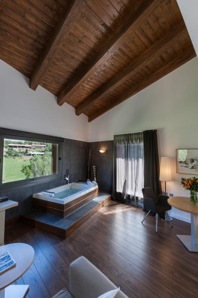 Cama o camas de una habitación en Bonansa Country Hotel