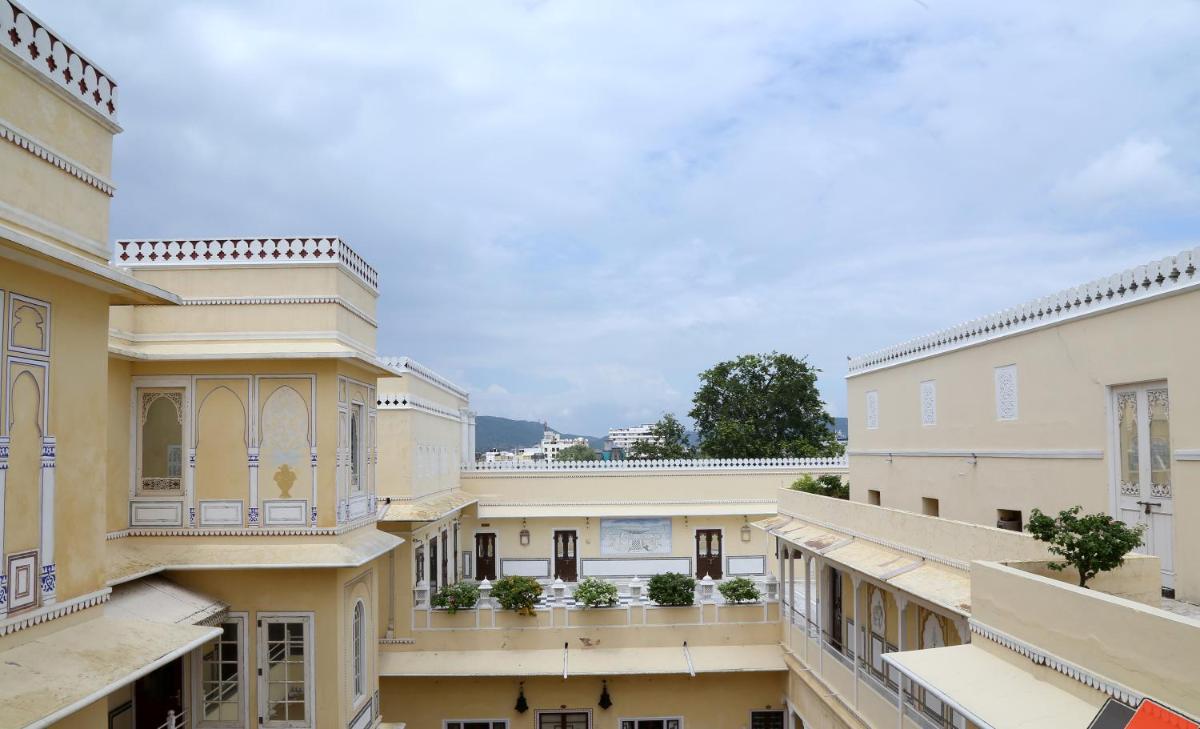 a view from the balcony of an apartment building at The Raj Palace (Small Luxury Hotels of the World) in Jaipur
