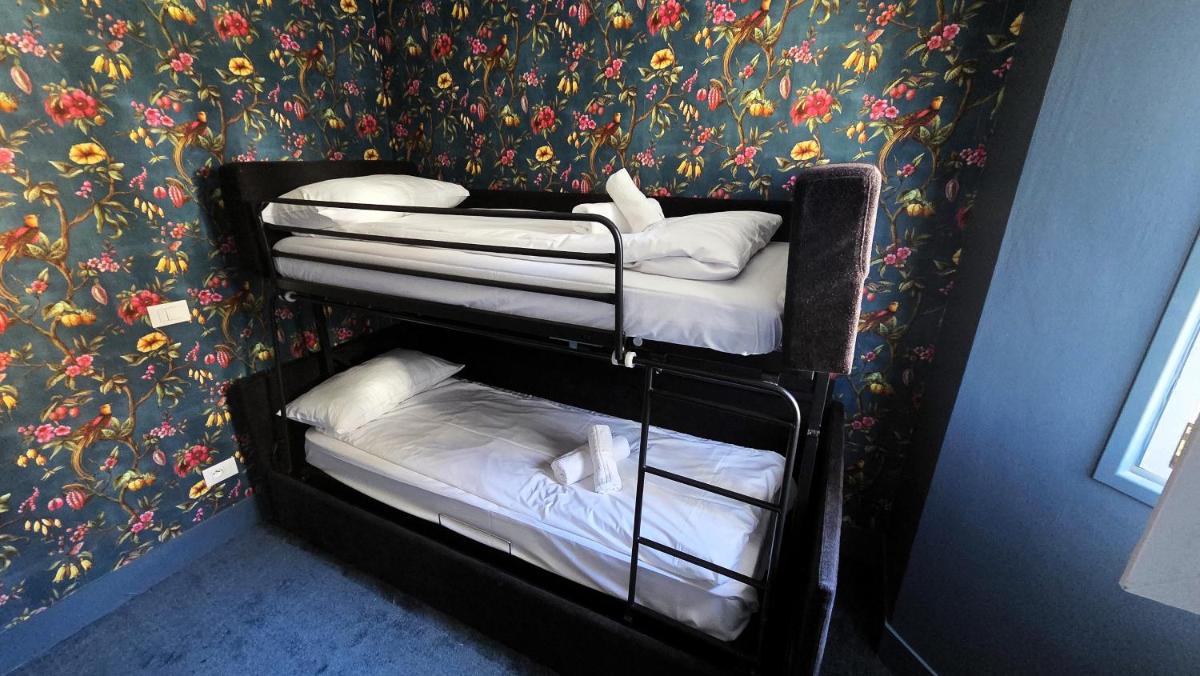 Un ou plusieurs lits dans un hébergement de l'établissement Hotel Turan & Spa
