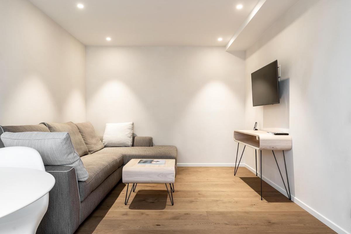 Télévision ou salle de divertissement dans l'établissement Villa Cosy, hotel & spa
