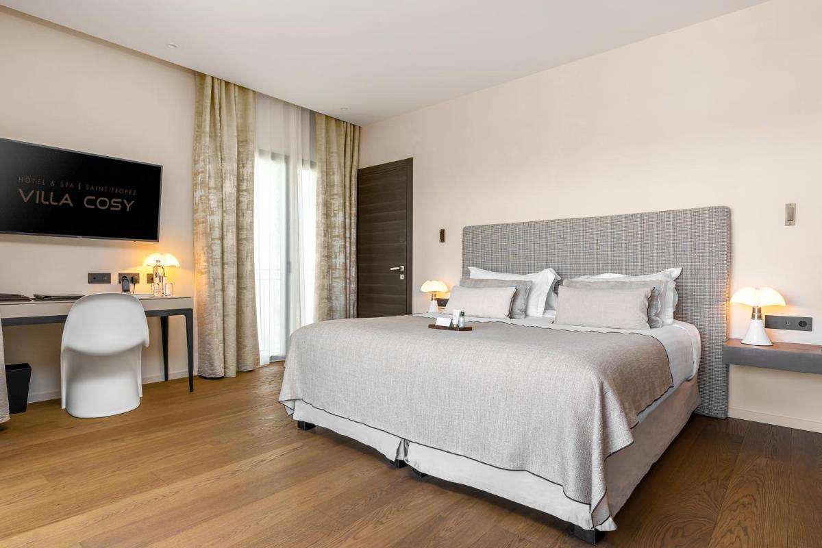 Un ou plusieurs lits dans un hébergement de l'établissement Villa Cosy, hotel & spa