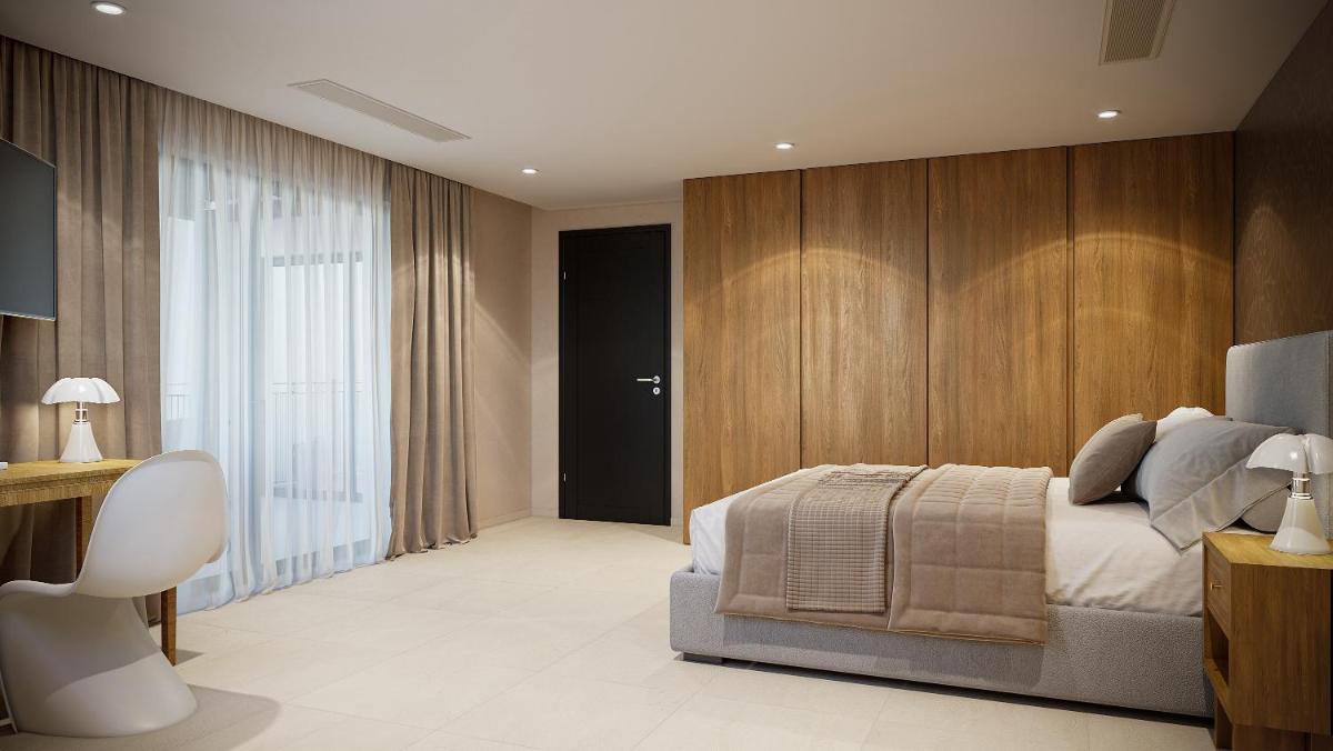 Un ou plusieurs lits dans un hébergement de l'établissement Villa Cosy, hotel & spa