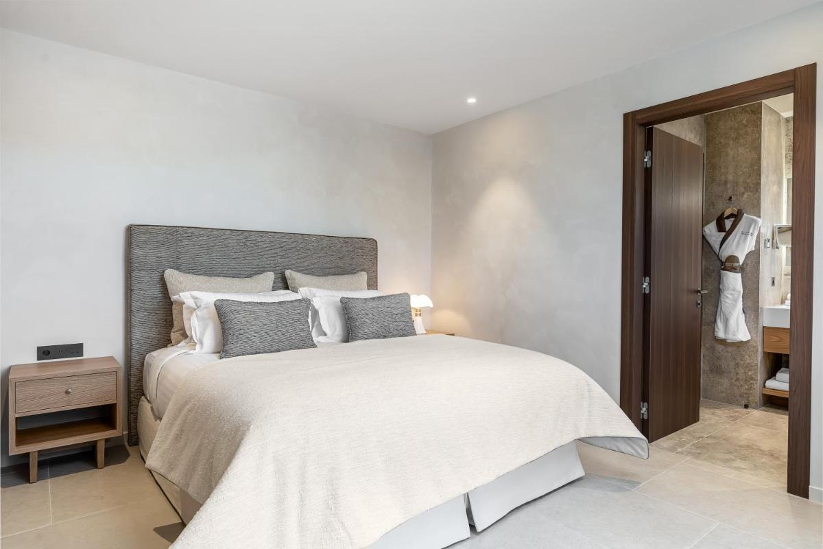 Un ou plusieurs lits dans un hébergement de l'établissement Villa Cosy, hotel & spa