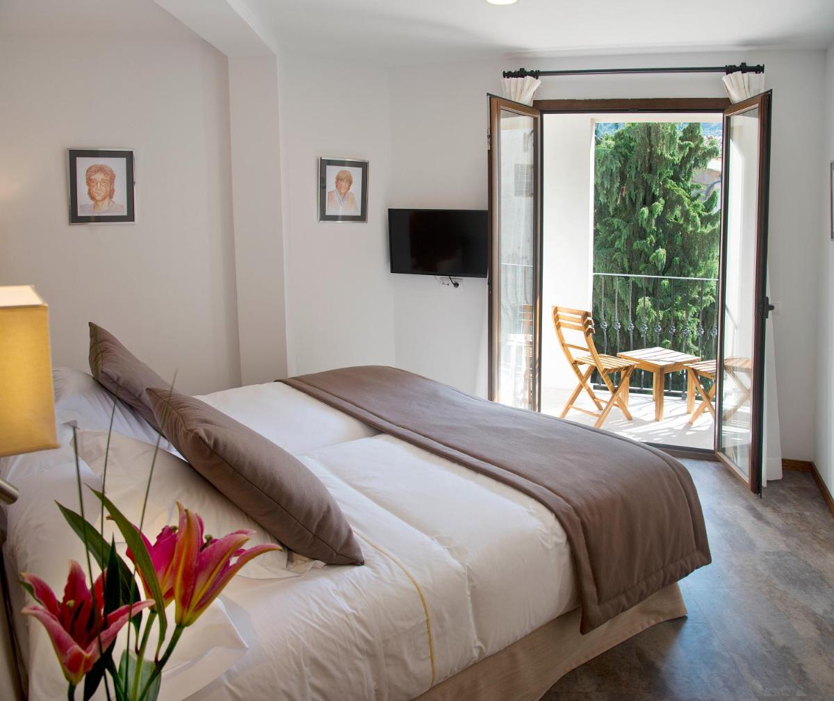 Cama o camas de una habitación en Gran Hotel Soller