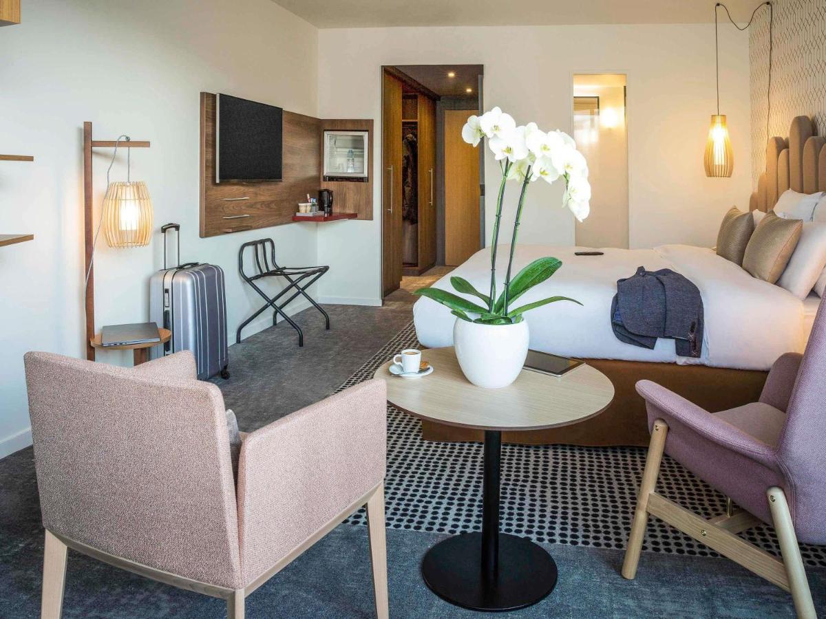 Télévision ou salle de divertissement dans l'établissement Mercure Aix-les-Bains Domaine de Marlioz Hôtel & Spa