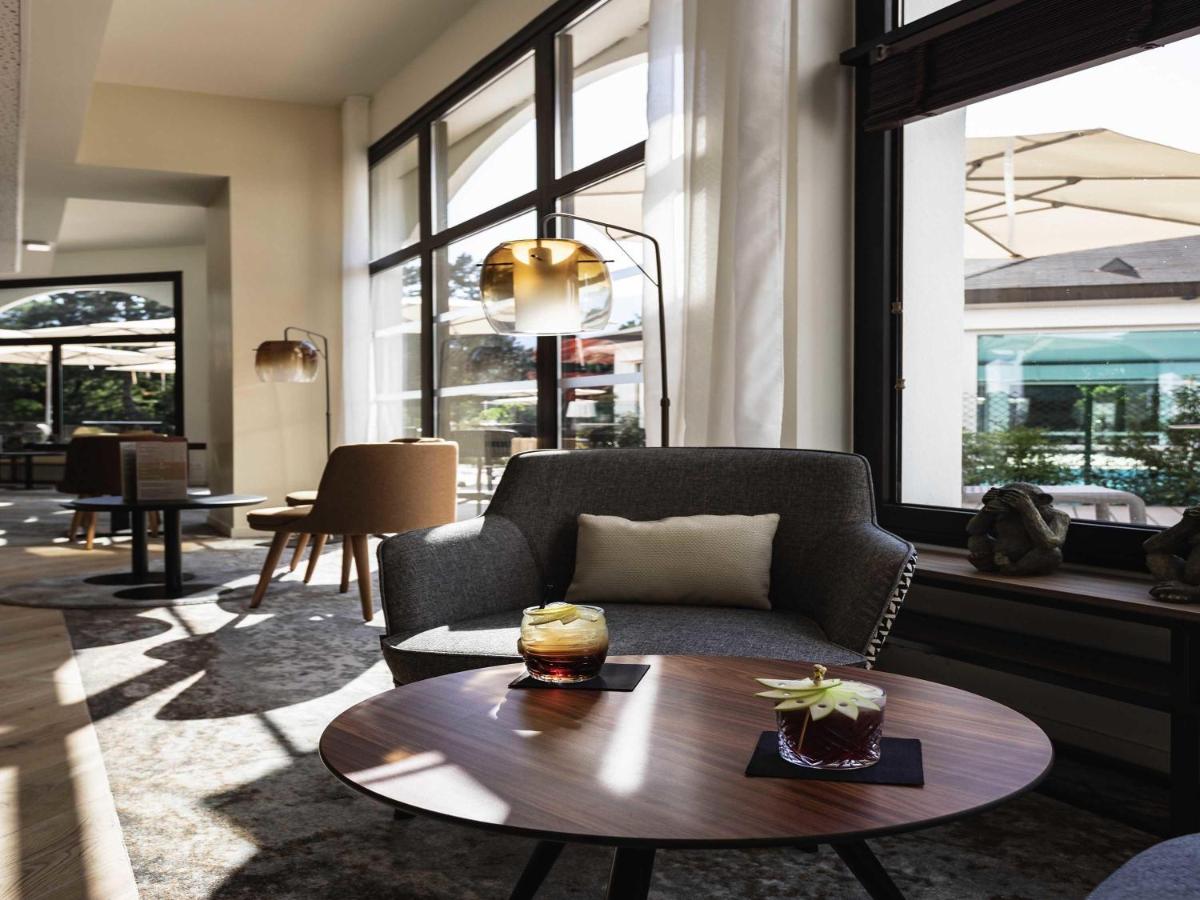 Coin salon dans l'établissement Mercure Aix-les-Bains Domaine de Marlioz Hôtel & Spa