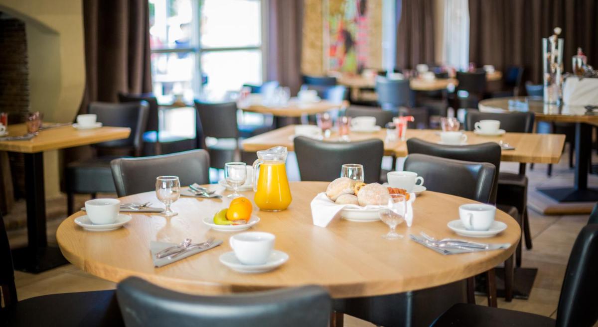 Restaurant ou autre lieu de restauration dans l'établissement Château L'Hospitalet Wine Resort Beach & Spa