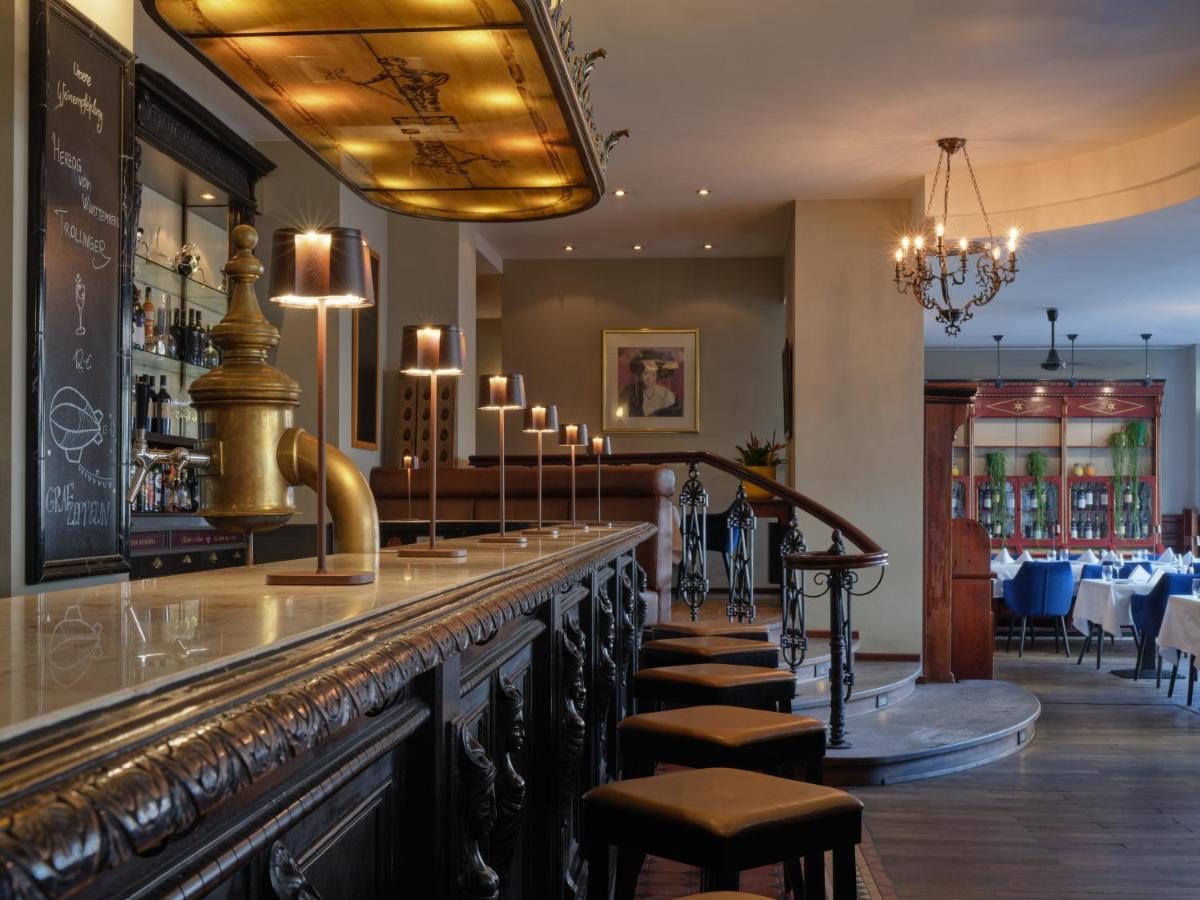 Ein Restaurant oder anderes Speiselokal in der Unterkunft Steigenberger Graf Zeppelin