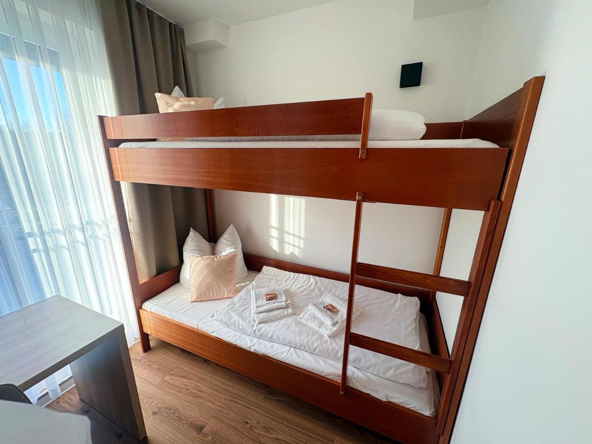Ein Bett oder Betten in einem Zimmer der Unterkunft Kaiserhof Feldberg by Belvilla Resorts