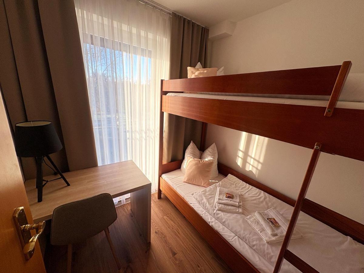 Ein Bett oder Betten in einem Zimmer der Unterkunft Kaiserhof Feldberg by Belvilla Resorts