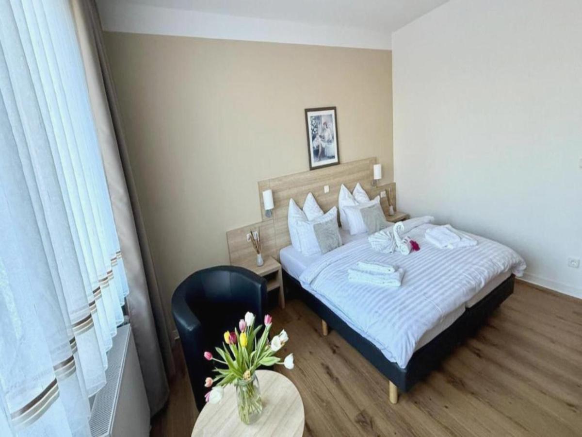 Ein Bett oder Betten in einem Zimmer der Unterkunft Kaiserhof Feldberg by Belvilla Resorts