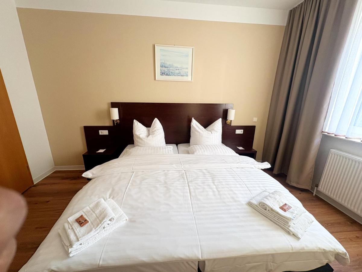 Ein Bett oder Betten in einem Zimmer der Unterkunft Kaiserhof Feldberg by Belvilla Resorts
