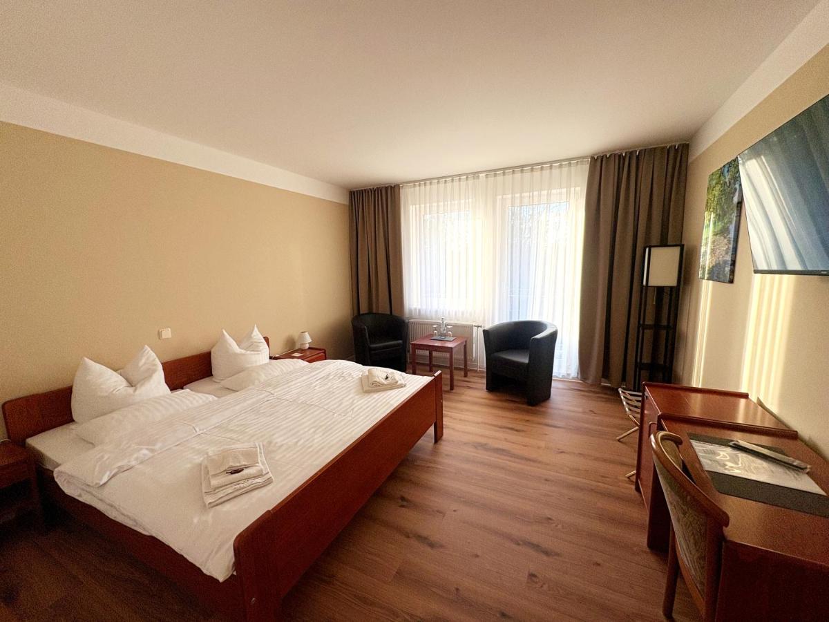 Ein Bett oder Betten in einem Zimmer der Unterkunft Kaiserhof Feldberg by Belvilla Resorts