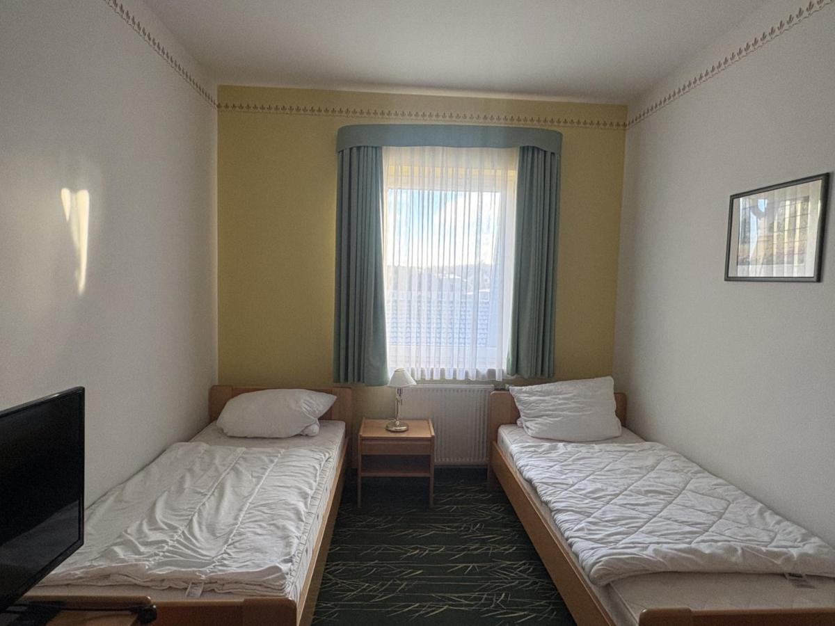 Ein Bett oder Betten in einem Zimmer der Unterkunft Kaiserhof Feldberg by Belvilla Resorts