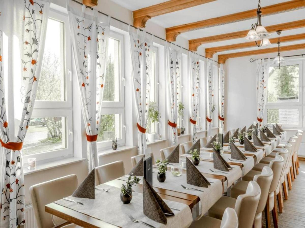 Ein Restaurant oder anderes Speiselokal in der Unterkunft Kaiserhof Feldberg by Belvilla Resorts